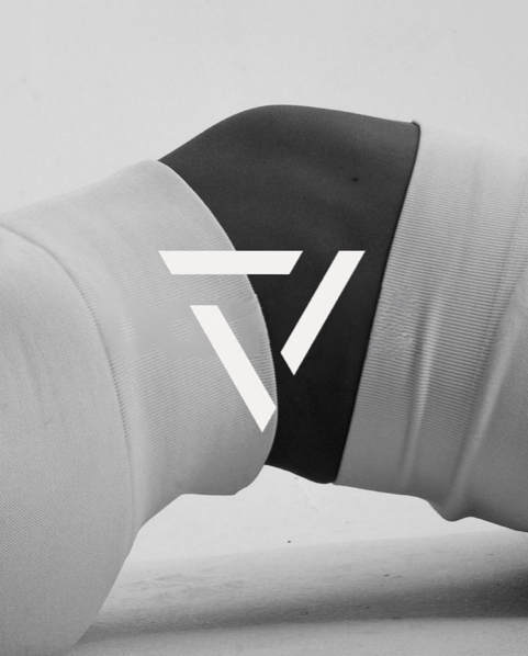 Close-up of a yoga pose in monochrome with the BLACKOUT mark overlaid